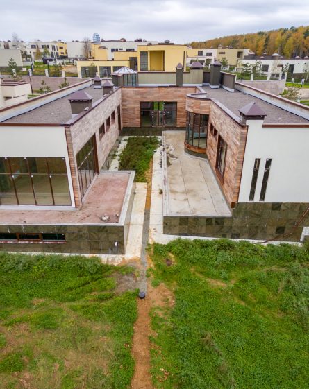 Modern country houses under construction as seen from air